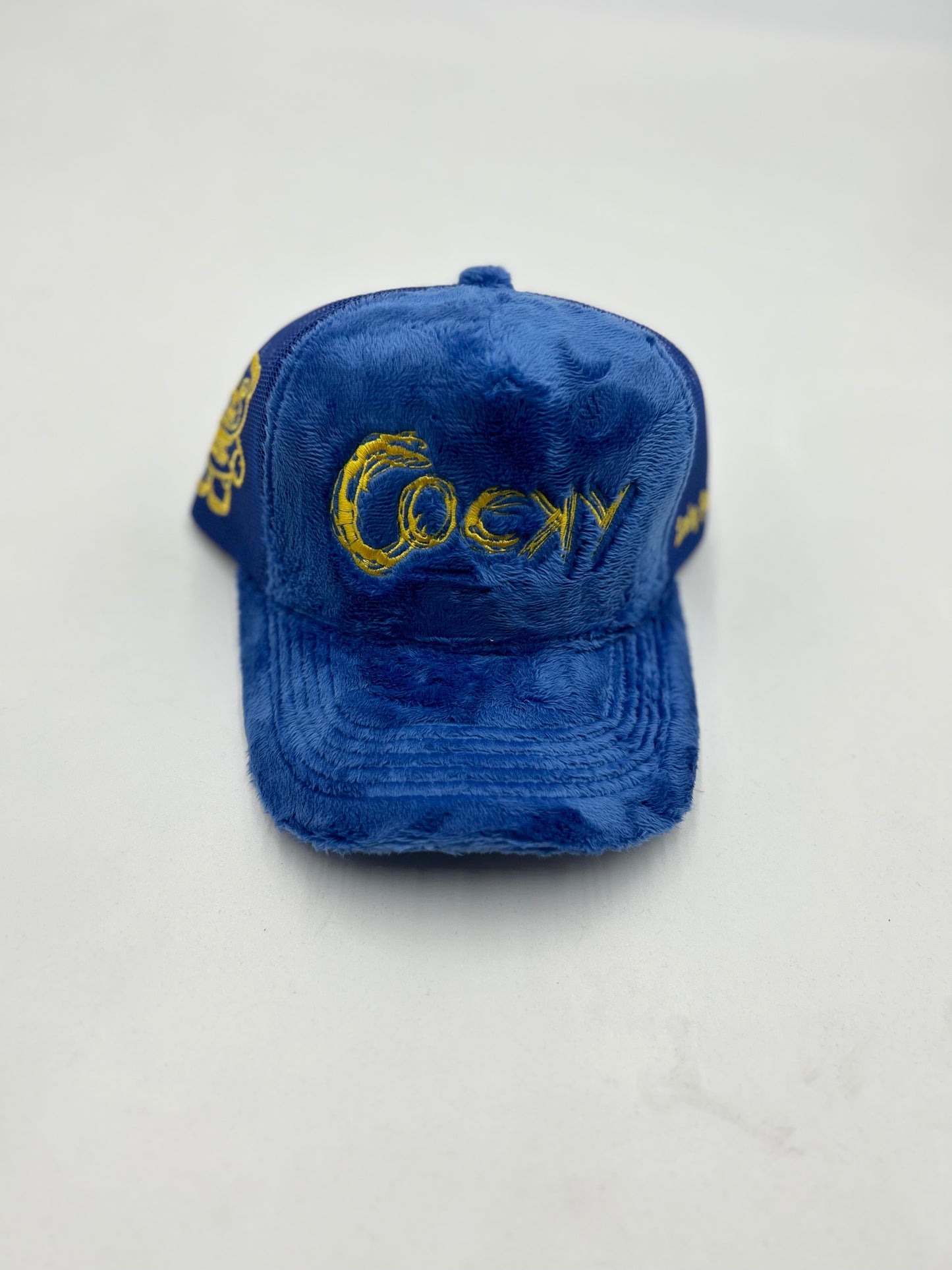 COCKY FUZZY EMBROIDERED TRUCKER HAT