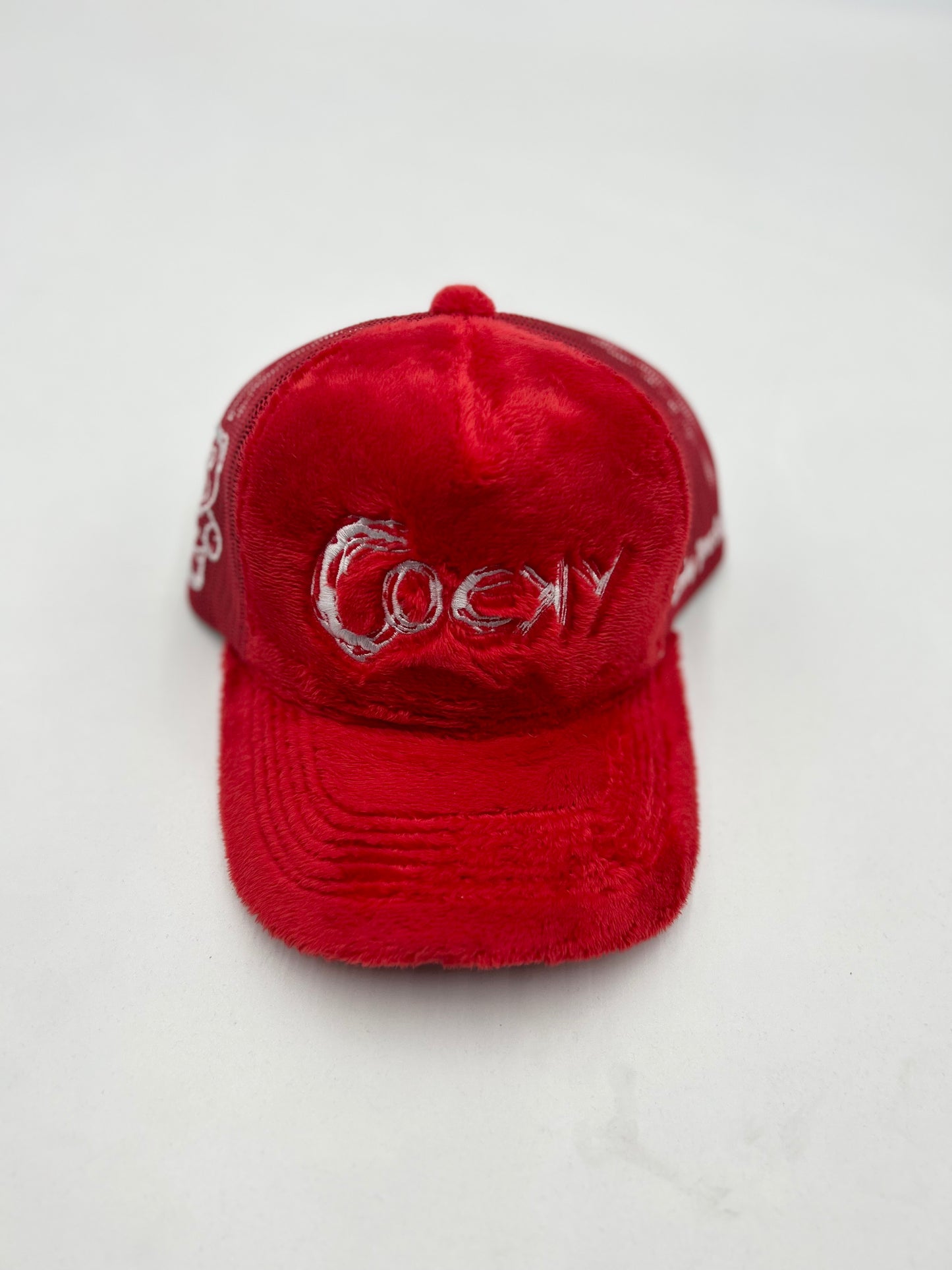 COCKY FUZZY EMBROIDERED TRUCKER HAT